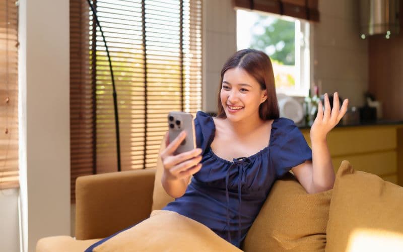 Patient viewing consultation prices on phone app